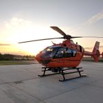 closeup photo of orange and black helicopter